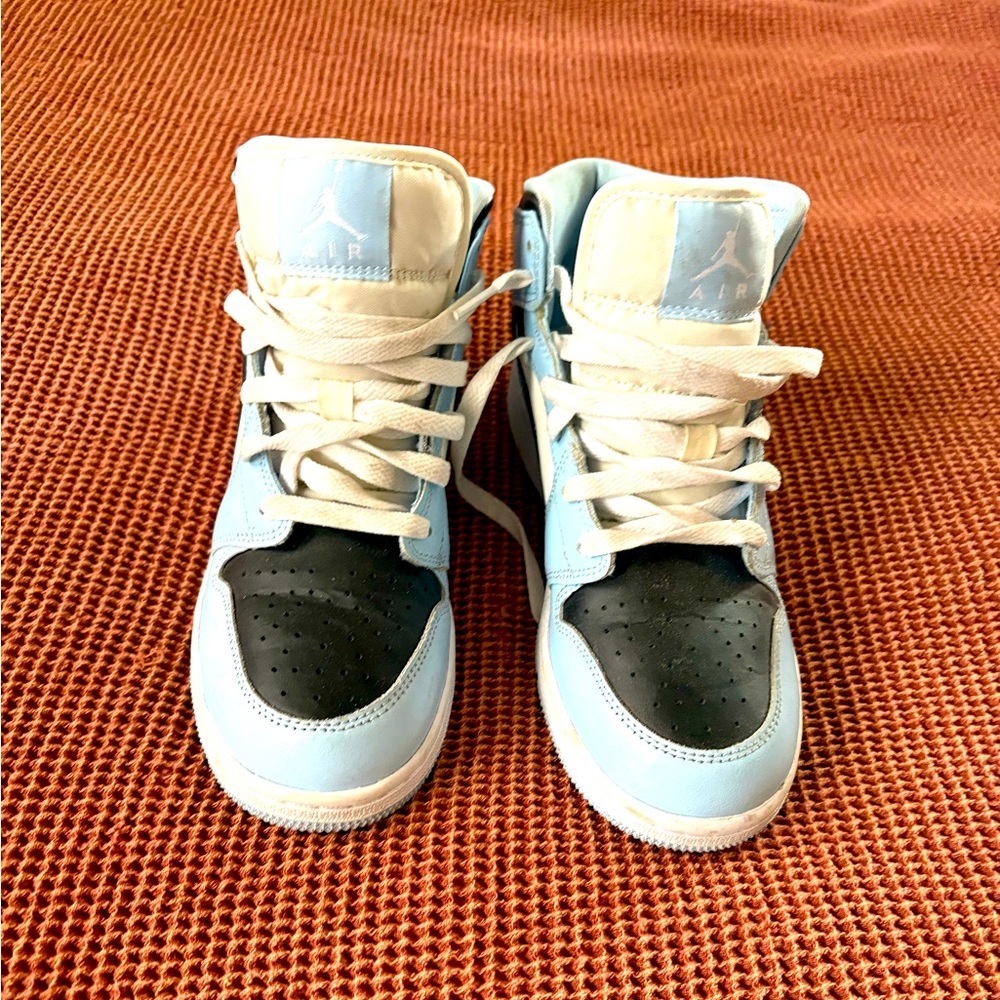 Nike Air Jordan’s blue/black, youth size 6. Worn only handful of times.